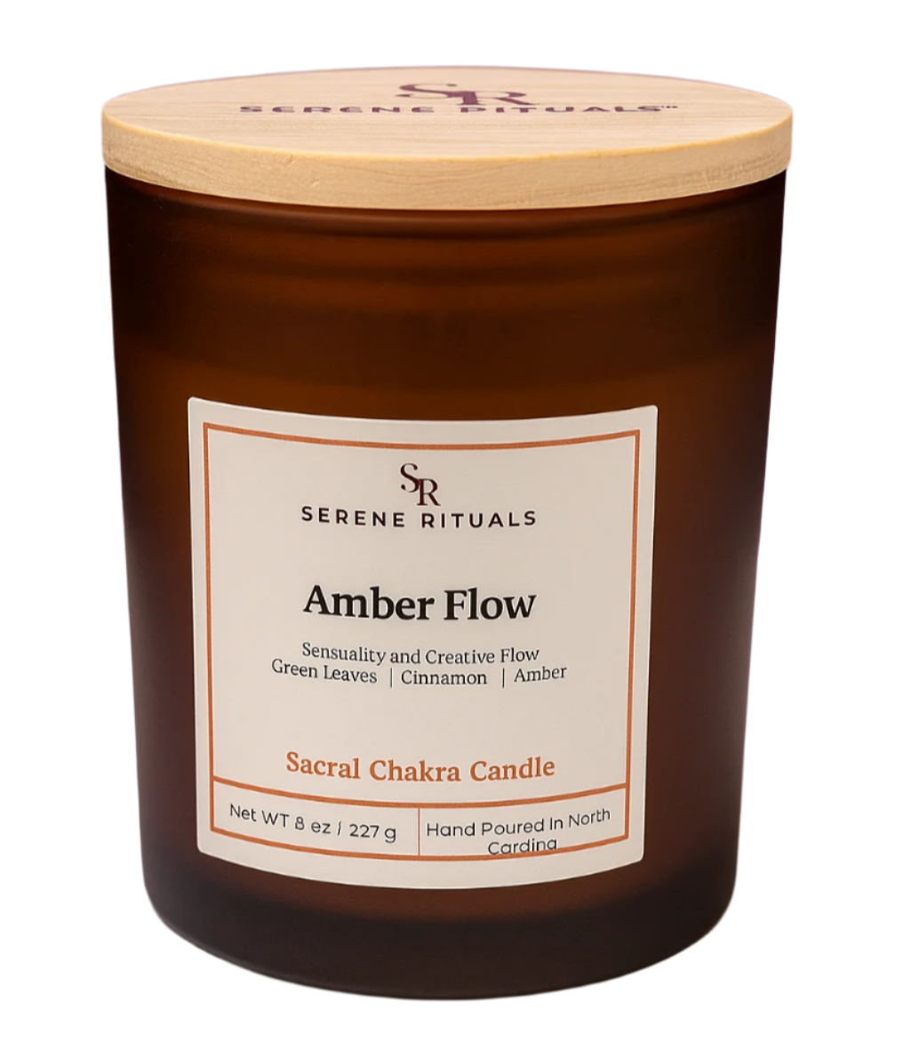 Serene Rituals Amber Flow candle with a wooden lid on a purple background