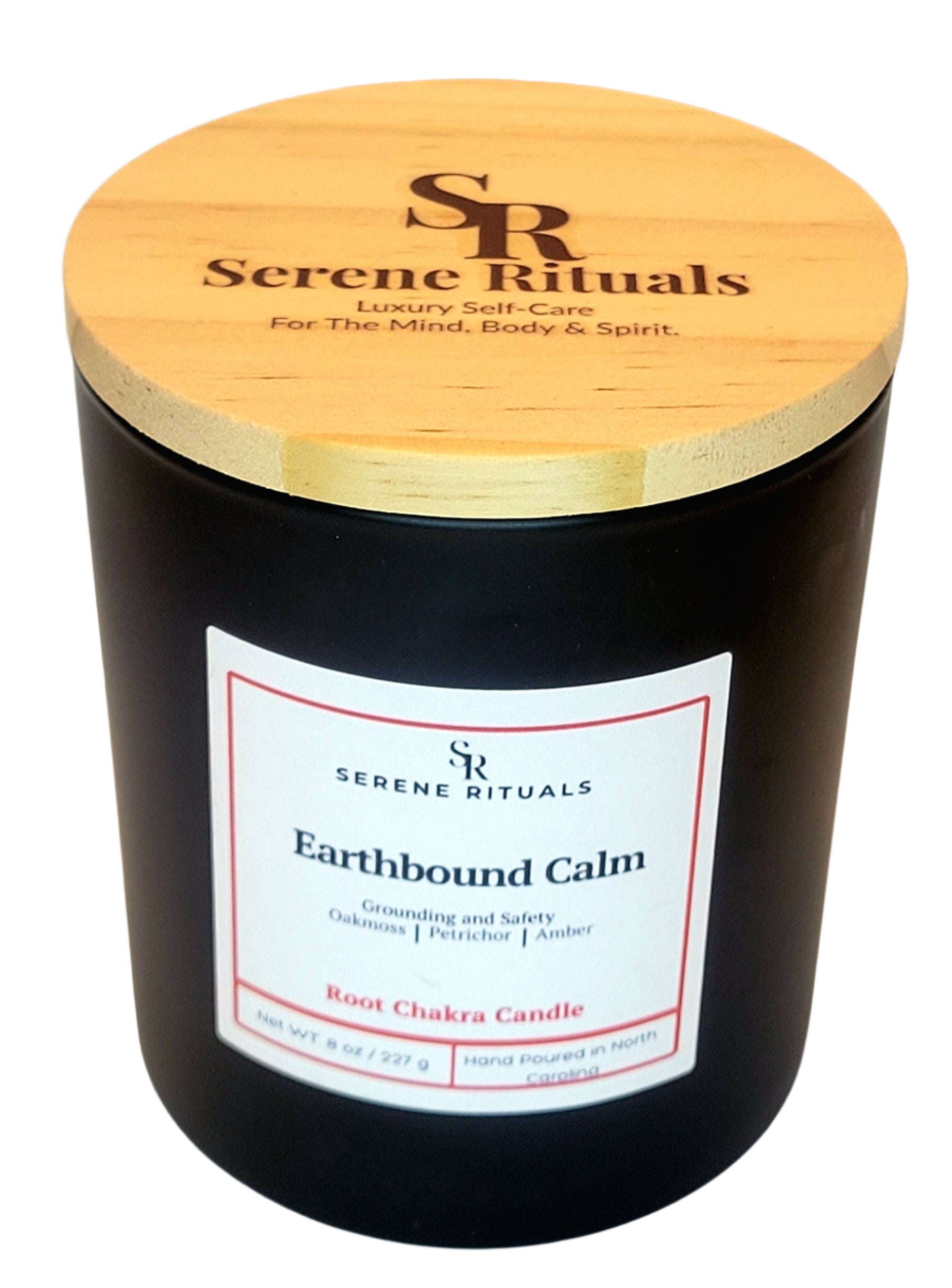 Earthbound Calm candle with wooden lid labeled 'Serene Rituals' on a white background