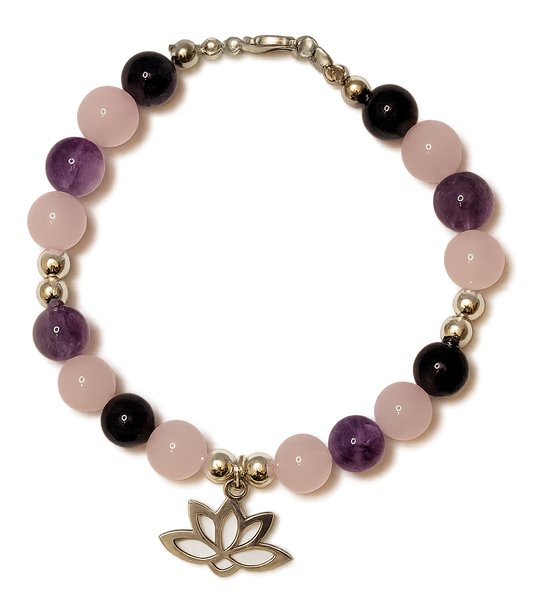 Heart and Soul Bracelet with Amethyst and Rose Quartz beads and lotus flower charm on a white background