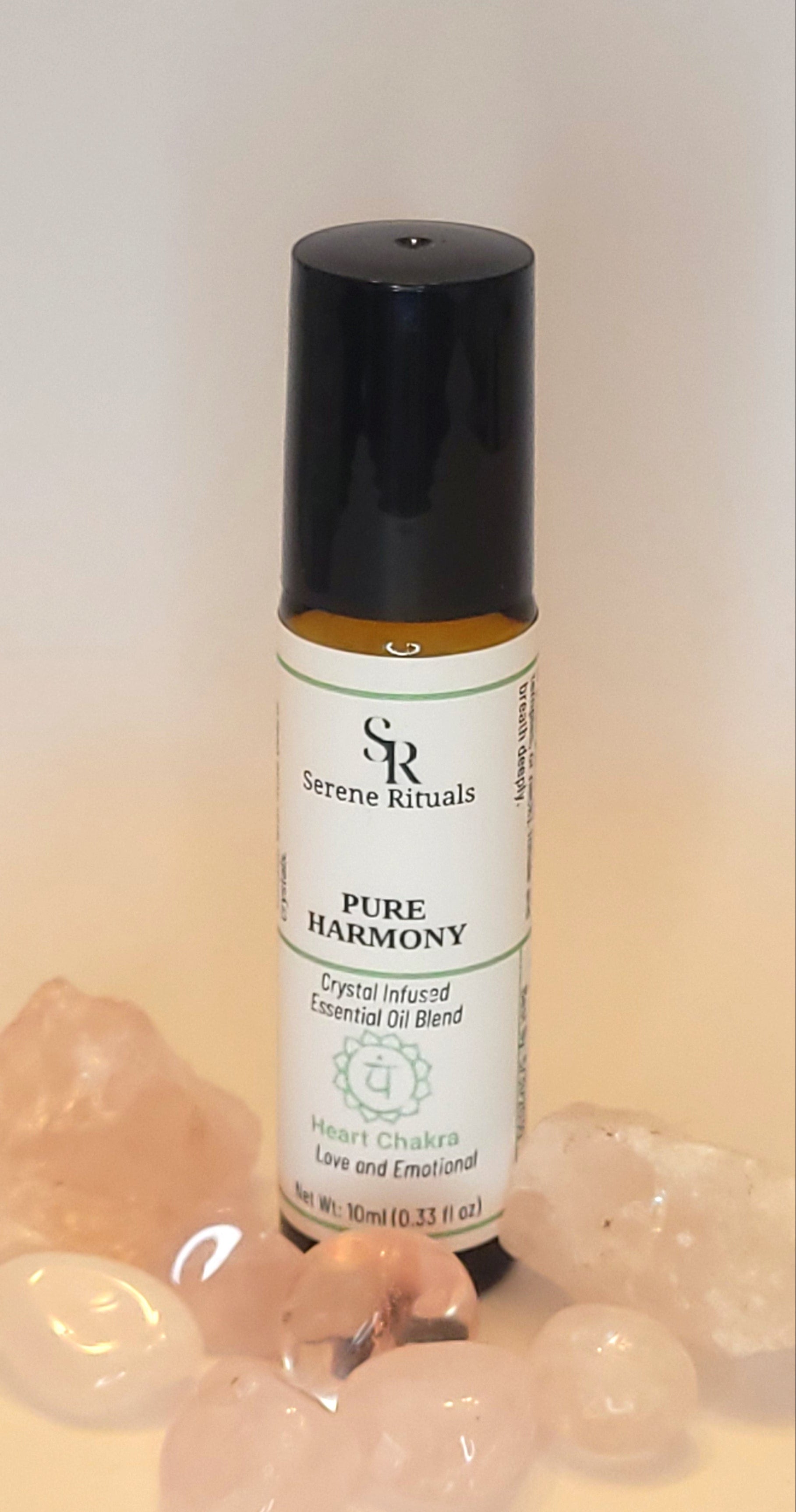 Pure Harmony essential oil blend with a label on a light surface next to rose quartz crystals