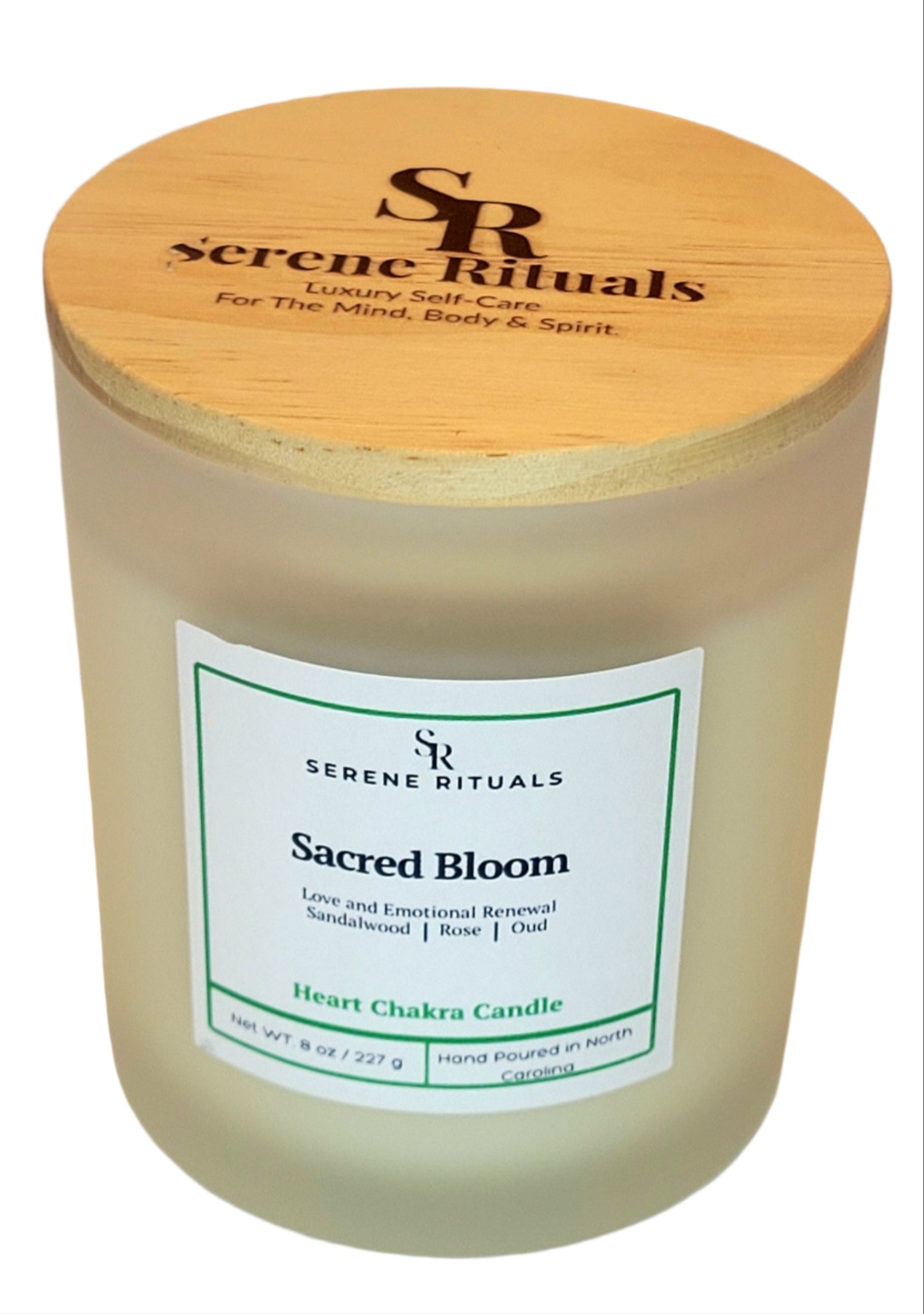 Scented candle with wooden lid labeled 'Serene Rituals Sacred Bloom' on a light background