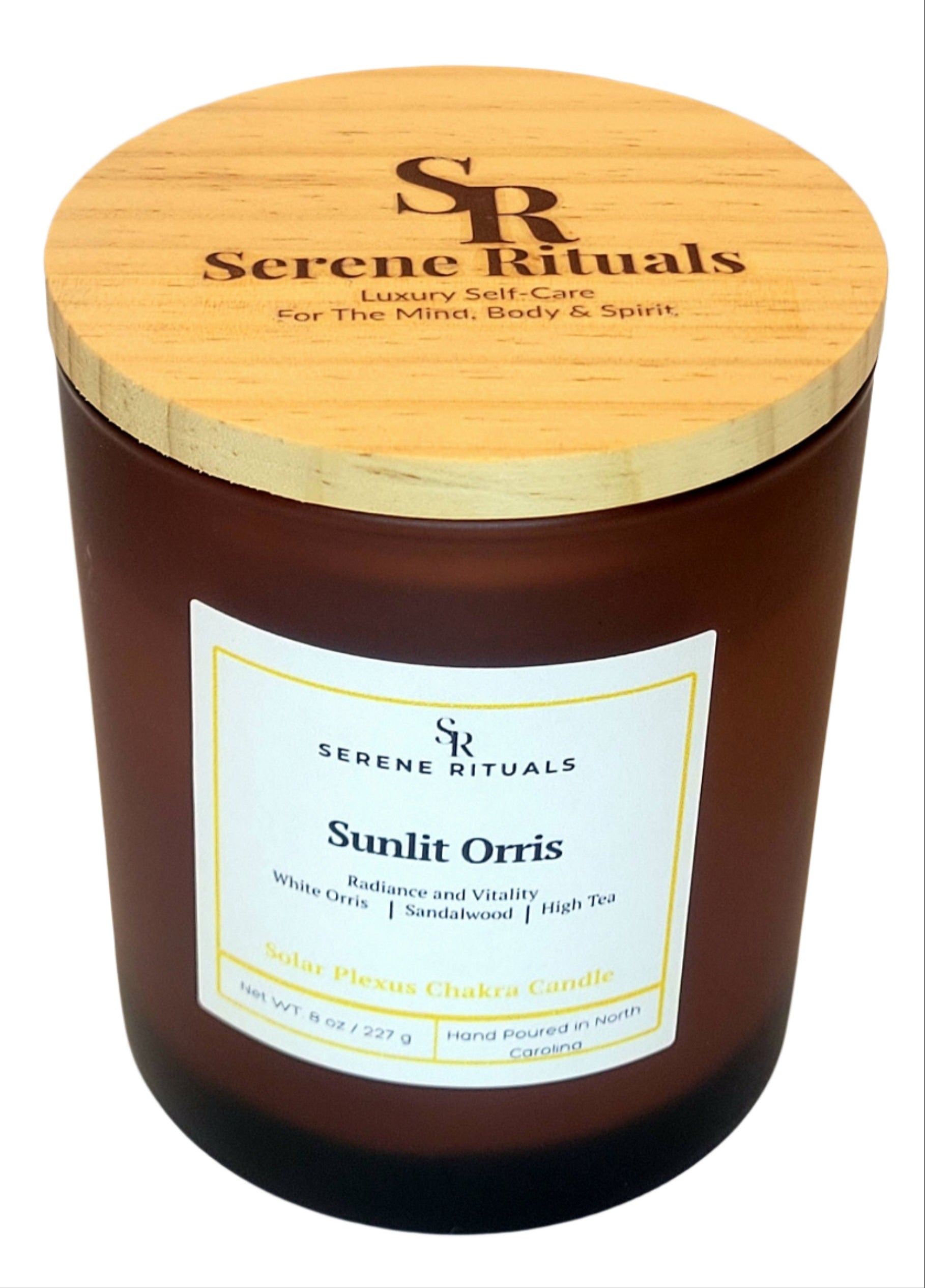 Serene Rituals Sunlit Orris candle with wooden lid on a light background
