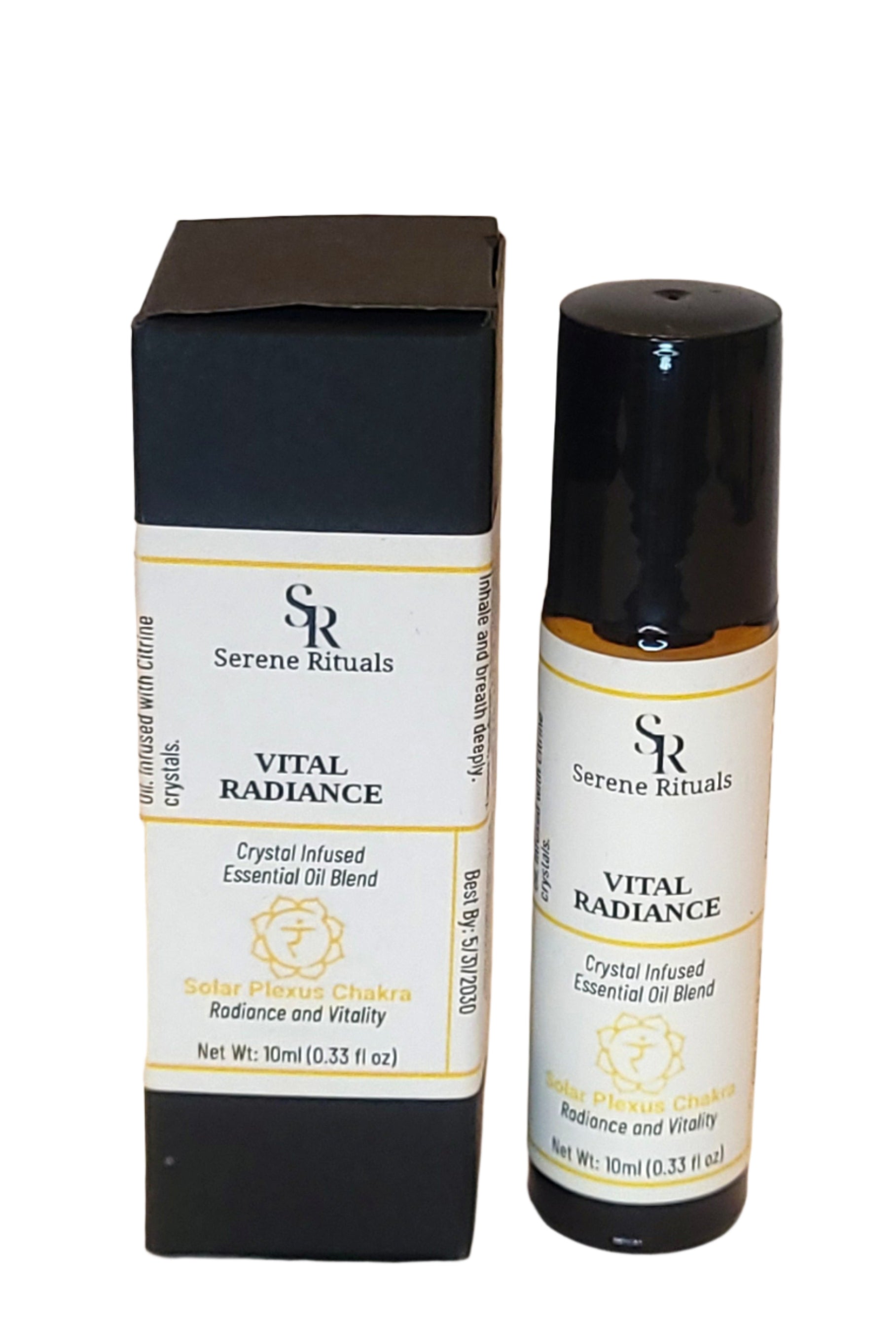 A bottle of Rituals essential oil with their packaging on a beige background